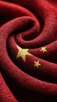 Rich texture of red fabric with golden stars representing national pride and identity of China photo