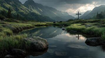 Mountains reflect serene beauty by a tranquil river with a cross at dusk in a peaceful valley photo