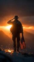 Soldier saluting at sunset with American flag during a moment of reflection in a mountainous landscape photo