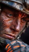 Close-up of a soldier in combat gear showing determination and focus in an intense moment during a mission photo