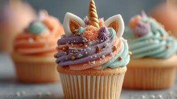 Colorful unicorn cupcakes with frosting and decorations for a festive celebration photo