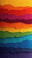 Vivid layers of colorful textured paper showcasing a gradient effect in bright hues and rich tones arranged in a visually engaging manner photo