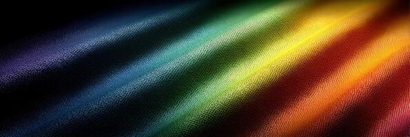 Colorful light rays creating a vibrant spectrum on a textured surface in an abstract composition photo