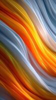 Colorful flowing waves create a dynamic abstract pattern in hues of orange, yellow, and blue against a soft backdrop photo