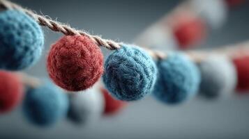 Colorful felt balls hanging on string create a festive atmosphere for decoration at a cozy gathering or celebration photo