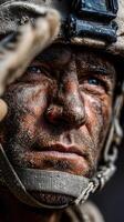 Soldier with camouflage face paint saluting in a wartime environment during an intense military operation photo