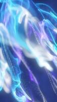 Abstract digital waveforms of luminous blue and purple light streams, forming fluid shapes in motion video