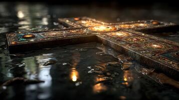 Intricate cross design illuminated in a damp, atmospheric setting during twilight hours photo