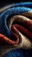 Close-up view of textured fabric showcasing vibrant colors and intricate patterns in soft, layered folds during daylight photo