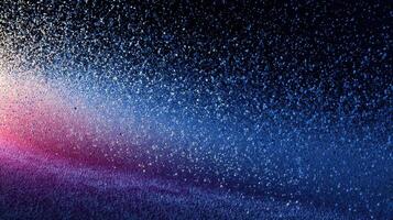 Colorful water droplets create a mesmerizing gradient effect against a dark background photo