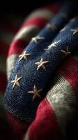 Woven fabric of flag displaying stars and stripes in detailed close-up capturing rich colors and textures photo