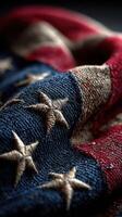 Vintage American flag draped with intricate stitching, showcasing its rich details and textures in muted lighting photo