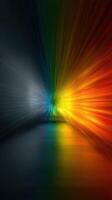 Vibrant light burst radiating from a central point creating colorful reflections in a dark space photo
