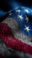Close-up view of worn American flag fabric revealing texture and colors photo