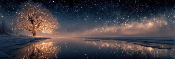 Bright tree illuminates snowy landscape under starry sky at night near a calm water surface in winter wonderland photo