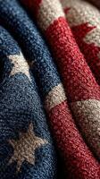 Textiles featuring a patriotic pattern with stars and stripes displayed closely together in vibrant colors photo