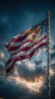 American flag waving proudly against a dramatic sky with clouds during sunset photo