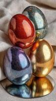 Festive display of metallic eggs arranged elegantly on a soft cloth surface during a spring celebration photo