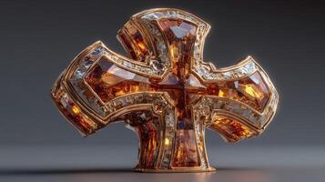 Decorative crystal cross with amber and clear gemstones showcased in a studio setting photo