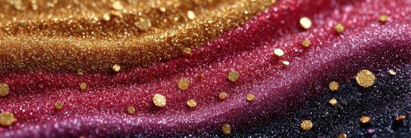 Colorful glitter waves create a mesmerizing visual display with shimmering gold and ruby tones on a dark background photo