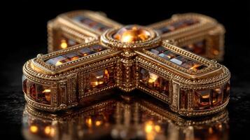 Intricate golden cross adorned with gemstones displayed on a reflective surface at a museum exhibit photo