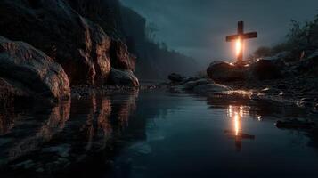 Illuminated cross by the river at twilight creates a serene and contemplative atmosphere photo