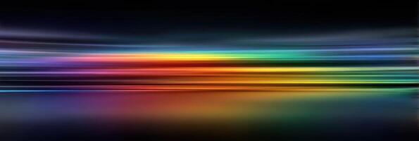 Vibrant light streaks create a colorful abstract pattern at night showcasing a blend of hues in motion photo