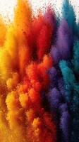 Colorful powder particles burst upward in a vibrant display during a celebration or art event photo