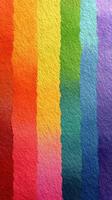 Vibrant color gradient showcasing a spectrum from red to purple on textured paper photo