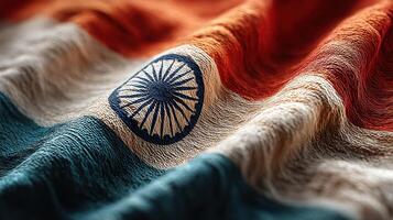 Indian flag gently waving in the breeze, showcasing orange, white, and green colors with the Ashoka Chakra in the center under natural light photo