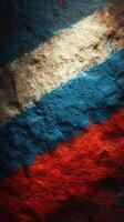 Colors of national pride displayed on a textured wall featuring blue, white, and red stripes in a dramatic lighting setting photo