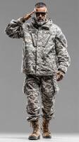 Soldier in military uniform saluting with confidence in a neutral gray background setting photo