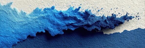 Colorful blue abstract art created with textured paper using different shades of blue watercolor photo