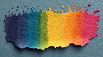 Vibrant watercolors blend together creating a spectrum of colors on textured paper photo