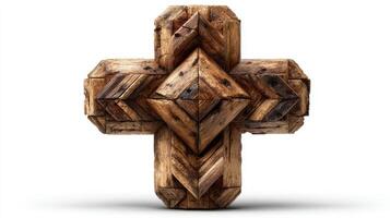 Wooden cross sculpture with intricate geometric patterns made from stacked timber pieces displayed on a plain background photo