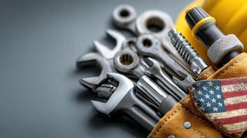 Tools arranged in a leather pouch for maintenance tasks in a workshop setting photo