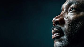 Portrait of a determined individual gazing upwards, expressing hope and resilience in a moment of contemplation photo