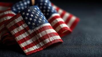Small United States flags arranged together on a dark surface showcasing vibrant colors and intricate details photo