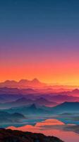 Vibrant sunrise illuminating mountain ranges and tranquil lake in tranquil landscape at dawn photo