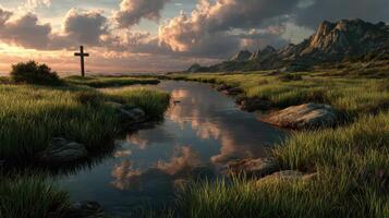 Serene landscape featuring reflective water and a cross during sunset near rocky mountains photo