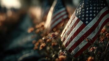 Memorial day tribute with American flags and flowers glowing in soft sunlight photo