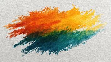 Colorful watercolor splash blending orange, yellow, and turquoise hues on textured paper surface photo