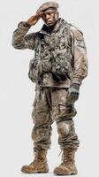 Soldier in tactical gear salutes while standing on a neutral backdrop during military operations practice photo