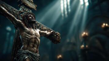 Wooden sculpture of Jesus Christ on the cross illuminated by dramatic lighting inside an ancient church photo