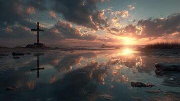 Sunset reflection over tranquil water with a cross at the shoreline creating a serene atmosphere photo