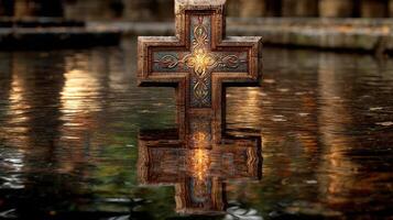 Intricate cross stands in tranquil water reflecting the beauty of nature in a serene location photo