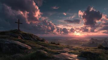 Sunset view from a hilltop with a cross and dramatic clouds in the sky photo