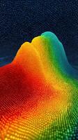 Brightly colored 3D landscape with vibrant peaks and valleys created from small dots in a digital environment photo