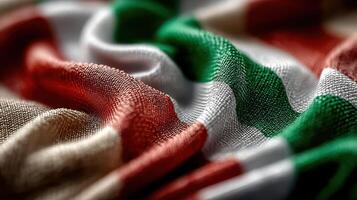 Textured fabric showcasing vibrant colors of the Italian flag draped on a surface photo