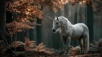 Majestic white unicorn stands gracefully in an enchanted forest during autumn twilight photo